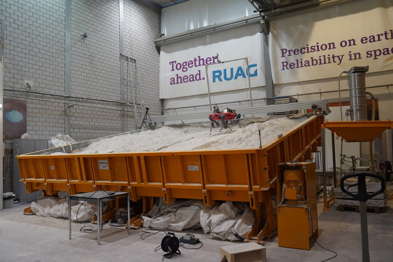 The tiltable ExoMars locomotion testbed filled with analog soil